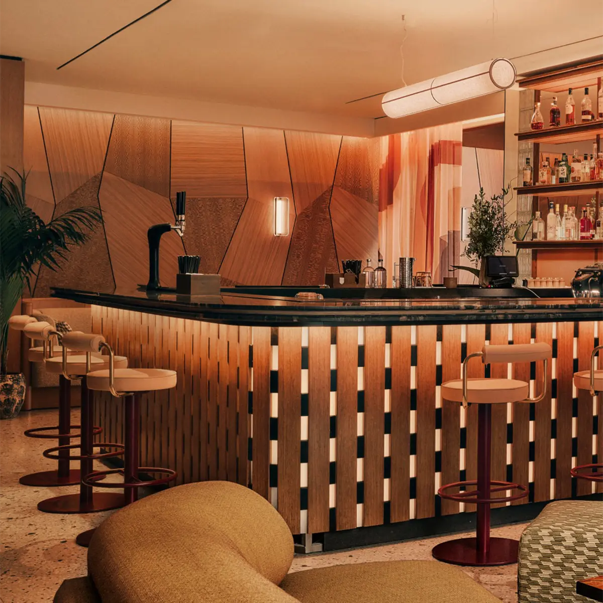 house-of-estila-library-etons-bespoke-furniture-bar.webp