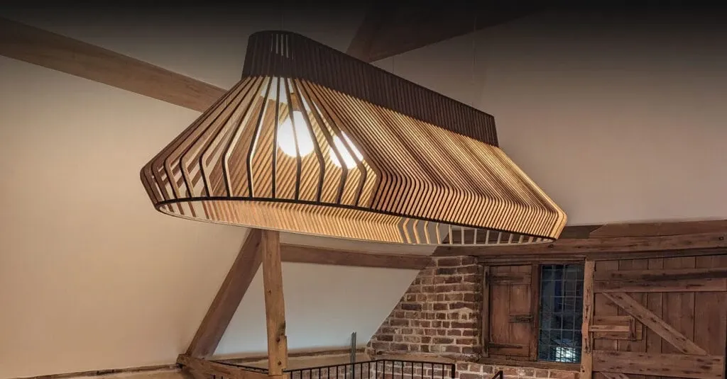 Handcrafted Fosbery Studio pendant light in a timber-framed interior